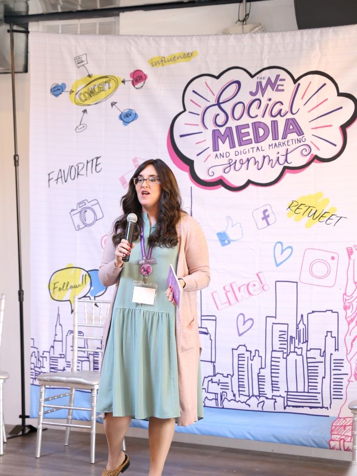 Abbey speaking at the Social Media Summit